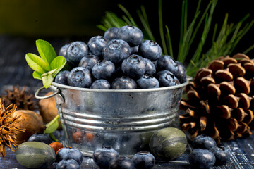 blueberry in a metal cup