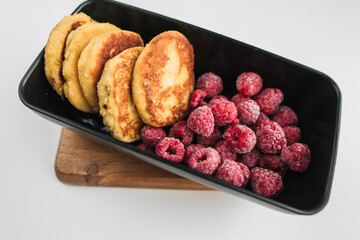 cheesecakes with berries in a lunch box