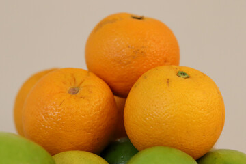 Beautiful lemons and oranges arranged on a table. A fruit rich in vitamin c.