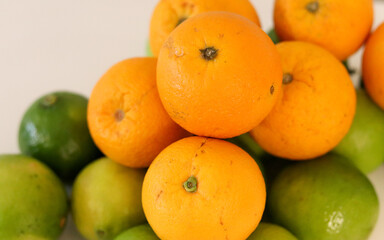 Beautiful lemons and oranges arranged on a table. A fruit rich in vitamin c.