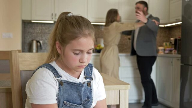 Family scandal. Parents quarreling, child is suffering.