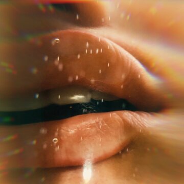 Close up of woman's mouth in water