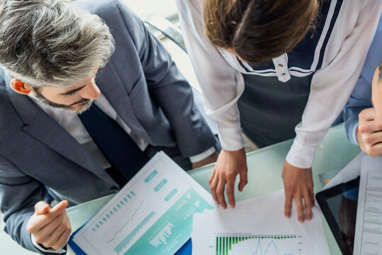 Business people discussing graph