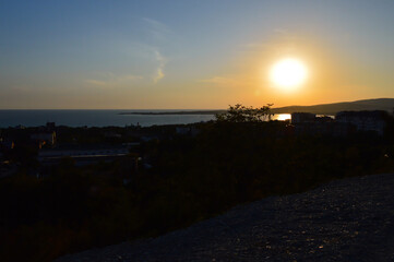 Fototapeta na wymiar Sea Bay in the rays of the setting sun