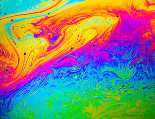 Fototapeta na wymiar Coloful rainbow psychedelic abstract patternt on soap bubble surface. Macro shot for design