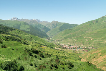 Fantastic view of highest mountain village in north ossetia in mountains with cloudy sky.