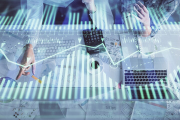 Double exposure of man and woman working together and data theme hologram drawing. Computer background. Top View.