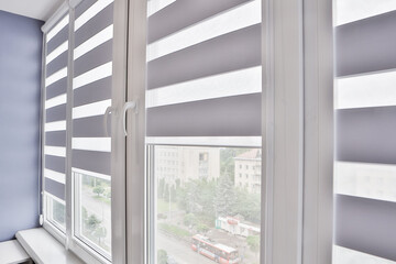 Windows with open modern horizontal blinds indoors, closeup - obrazy, fototapety, plakaty