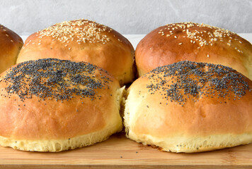 hot homemade buns with sesame and poppy seeds