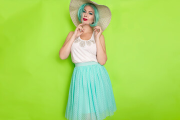 Beautiful young mint haired woman in white top and blue middle skirt wearing white and black hat.