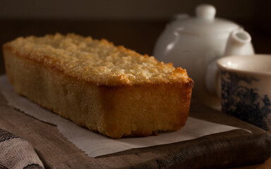 Cassava cake and tea pot in a breakfast table