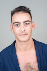 Fototapeta premium Portrait of young handsome man against white background