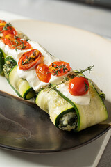 Zucchini Filled with Cream Cheese Spinach and Tomato Cherry