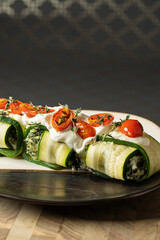 Zucchini Filled with Cream Cheese, Spinac and Cherry Tomatoes 