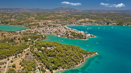 Aerial drone photo of famous fjord seaside village and bay of Porto Heli in the heart of Argolida prefecture, Peloponnese, Greece