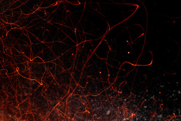 Campfire Sparks Flying in Dark