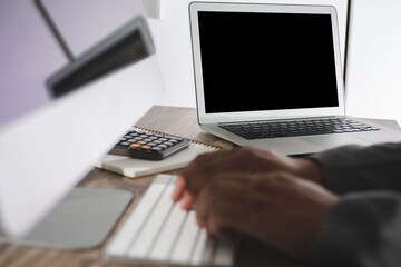 young man working Businessman using a desktop computer of the blank screen