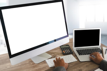 Fototapeta premium Man of business man hand working on laptop computer on wooden desk Laptop with blank screen on table.