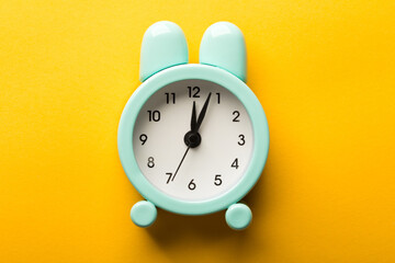 Clock Isolated On Yellow Background