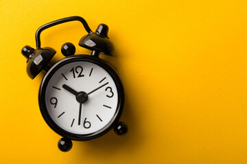 Clock Isolated On Yellow Background