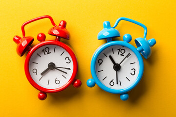 Clocks Isolated On Yellow Background