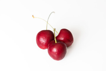Ripe cherry on a white background, close-up. Healthy and tasty food.