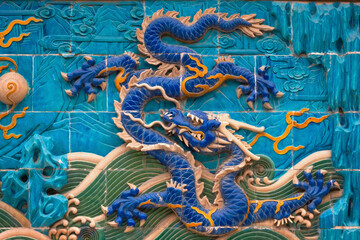 A Nine-Drgon Screen at Beihai Park, composed of 9 diferent Chinese Dragons found in Chinese imperial palaces and gradens