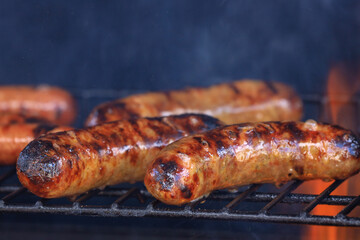 sausages on the grill