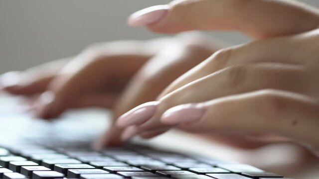 Business woman hands type on laptop keyboard business 4K Hands touch typing pointing cloud data social network media, Businesswoman working on tablet computer,Extreme close-up human hands on keyboard