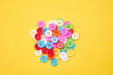 Color various sewing buttons.