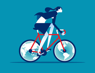 A woman ride a bicycle with globes for wheels
