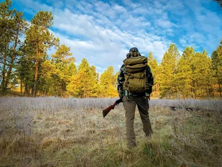Fotobehang Man turkey hunting in Montana © melissadoar