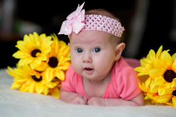 Portrait of cute adorable white Caucasian baby girl boy with two months old