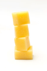 Close Up of Mozzarella Cheese Cubes Isolated on White Background