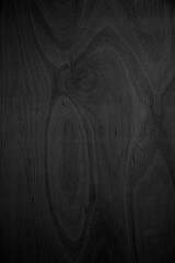 Close-up corner of wood grain Beautiful natural black abstract background Blank for design and require a black wood grain backdrop
