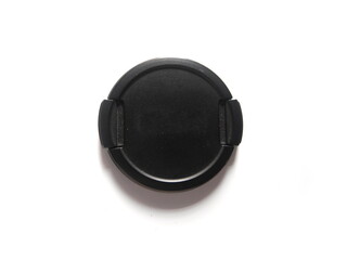 Black color circular camera lens cap on white background