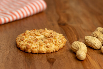 sable biscuits with chopped peanuts on top	
