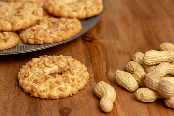 sable biscuits with chopped peanuts on top	
