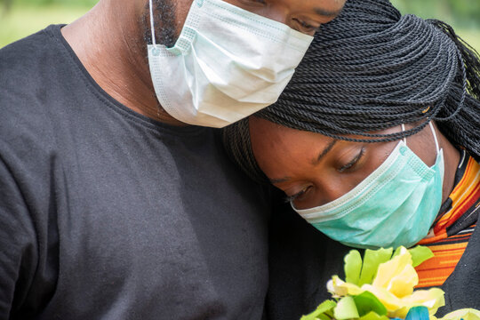 Black People Mourning Lost Ones To Coronavirus, Wearing Face Masks, Showing Support For Each Other