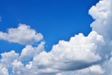 Naklejka na ściany i meble Blue sky with white cloud in a sunny day