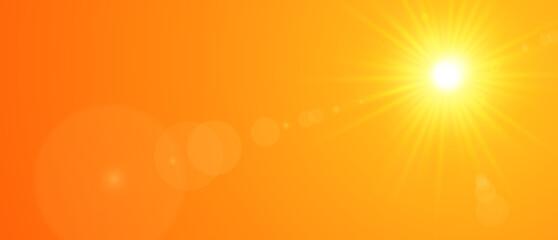 The sun shines brightly. With an orange sky in the evening - 364894345