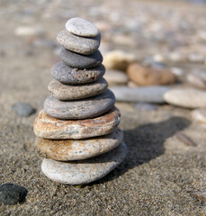 Round pebble tower on the beach