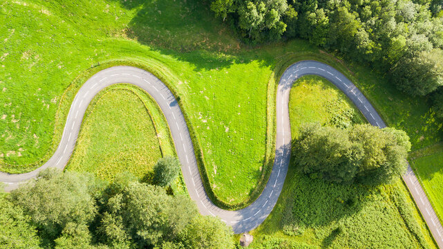 aerial view of curved road