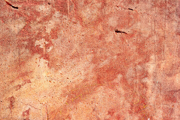Fototapeta premium Texture of a concrete wall with cracks and scratches which can be used as a background