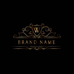 Fototapeta na wymiar W premium luxury gold monogram logo. W letter logo. W monogram luxury gold logo.