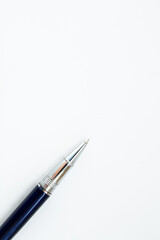 pen on a piece of a paper