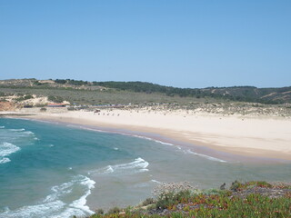Fototapeta na wymiar the beach of odeixe in Portugal is a surfers paradise Der Strand von odeixe Portugal ist ein Surfparadies