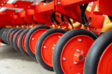 Close-up of technical units and mechanisms of agricultural machinery. Structural elements for tillage and harvesting