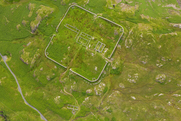 Aerial of Hardknott Roman Fort is an archeological site, the remains of the Roman fort Mediobogdum, located on the western side of the Hardknott Pass in the English county of Cumbria