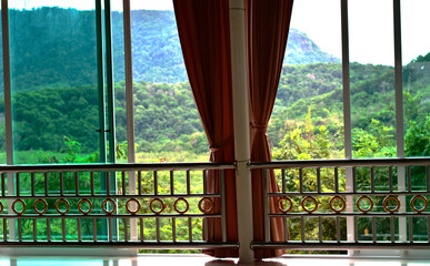 
At the window looking out over the trees and mountains